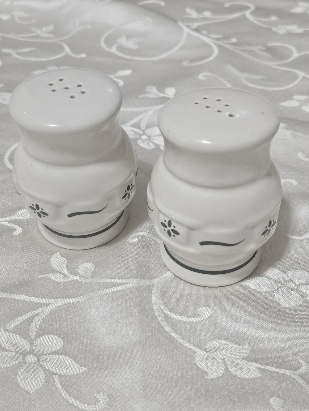 Longaberger White Ceramic Salt and Pepper Shakers with Navy Floral Accent